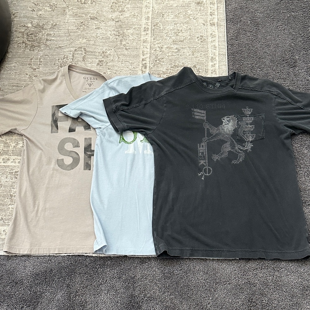 Bundle of three Men’s Medium Guess short sleeve t-shirts.